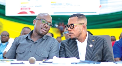 Prof. Lucas Nana Wiredu Damoah (left), Board Chairman, conferring with Dr Alex Asmah, CEO, at the meeting