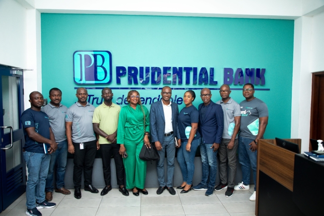 Some of the customers in a group photo with Prudential Bank staff and UPI Representatives Prudential Bank and UnionPay International intensify support for Ghana-China traders through card education drive