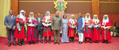 President Mahama (6th from left), Vice-President Prof. Naana Jane Opoku-Agyemang (6th from right) and the new Supreme Court Justices 