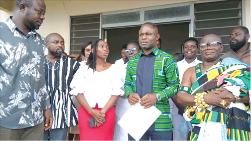 Kwabena Mintah Akandoh (2nd from right), Minister of Health, with D. Deborah Mensah (3rd from left) and some chiefs