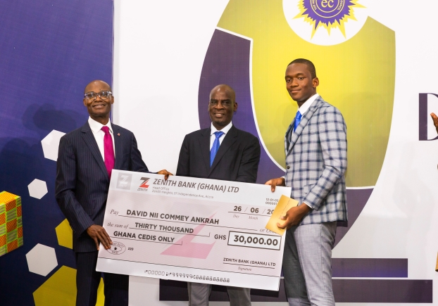 Divisional Head of Zenith Bank, Mr. James Wiafe Akenten (left) with the Minister for Education, Honourable Haruna Iddrisu (middle) presenting the cash prize to Master David Nii Commey Ankrah from Hope College (right). Zenith Bank's CSR shines through continuous Investment in Education