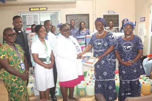 Deaconess Dr Gify Nyante (2nd from right), Women's Ministry Leader, Church of Pentecost Madina Area, presenting the items to Dr Barbara Swanzy-Asare (3rd from left), Clinical Coordinator and Head of the Paediatric Department. Picture: ESTHER ADJORKOR ADJEI Deaconess Dr Gify Nyante (2nd from right), Women's Ministry Leader, Church of Pentecost Madina Area, presenting the items to Dr Barbara Swanzy-Asare (3rd from left), Clinical Coordinator and Head of the Paediatric Department. Picture: ESTHER ADJORKOR ADJEI