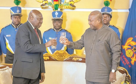 President John Mahama sharing  a toast with Gonfouli Souariba, Ambassador of the Republic of Chad