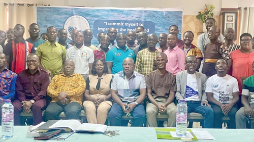 Donkris Mevuta (3rd from left), Executive Director of Friends of the Nation, with dignitaries and workshop participants
