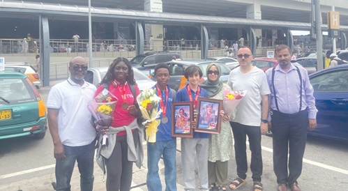 The contestants displaying their medals at the Kotoka International Airport. With them are their parents and teachers of the school The contestants displaying their medals at the Kotoka International Airport. With them are their parents and teachers of the school