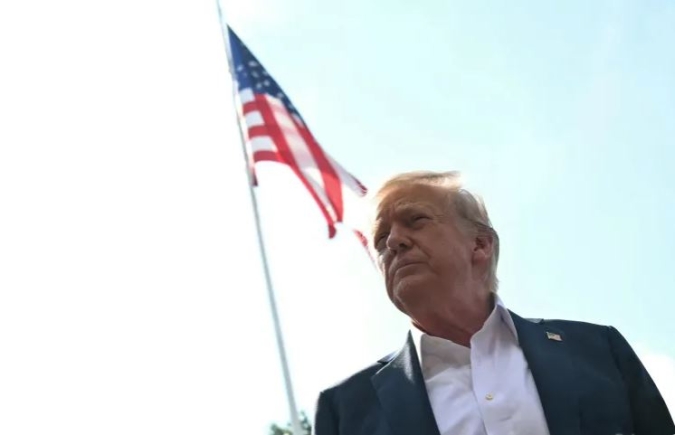 US President Donald Trump speaks to the media before boarding Marine One on the South Lawn of the White House in Washington, DC on July 11, 2025 [Andrew Caballero-Reynolds/AFP]