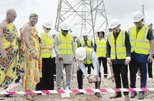 John Abdulai Jinapor (with pick axe), Minister of Energy and Green Transition, breaking the ground for the reconstruction of the 161KV transmission line at  Anwomaso. Looking on include Nana Osei Boa (2nd from left),  Anwomasohene; Irchad Razaaly (2nd from right), EU Ambassador to Ghana; Clementine Dardy (3rd from left), Director of AFD; Dr Frank Amoakohene (middle), Ashanti Regional Minister, and Mark Awuah Baah (right), acting Chief Executive, GRIDCO. Picture: EMMANUEL BAAH