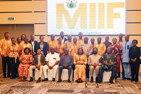 Mr Richard Kwame Asante (seated middle), Board Chairman, Mrs Justina Nelson (seated 3rd from right), and other board members on the front row in a picture with MIIF management and other stakeholders MIIF board pledges commitment to fund's mandate at strategic retreat