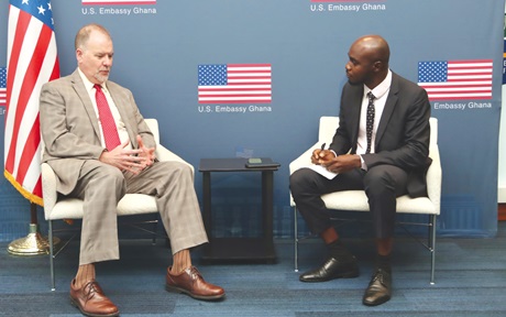 Rolf Olson, Chargé d’Affaires of the US Embassy in Ghana, explaining a point to Pacome Emmanuel Damalie (right), our reporter. Picture: ELVIS NII NOI DOWUONA