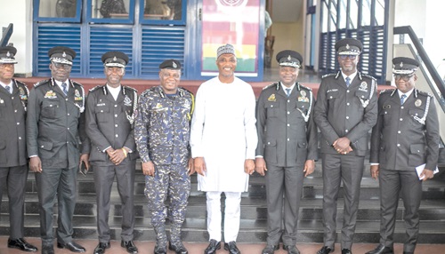 Muntaka Mohammed-Mubarak (4th from right), Minister for the Interior, with COP Christian Tetteh Yohuno (4th from left), IGP, and the new Commissioners. Picture: DOUGLAS ANANE-FRIMPONG