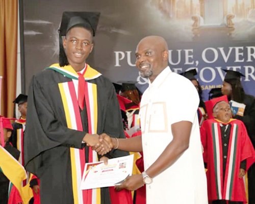 Mastin Tamba Saah (left), Ghana 2025 Valedictorian, British Columbia College, receiving his certificate from Paul Dovi, PTA Chairman Mastin Tamba Saah (left), Ghana 2025 Valedictorian, British Columbia College, receiving his certificate from Paul Dovi, PTA Chairman