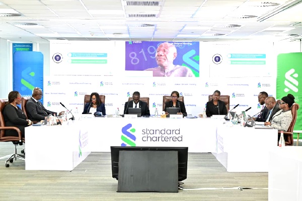 • Directors and Staff of the bank deliberating at the AGM StanChart declare GH¢1.67 dividend share