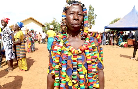 Abugri Ajabow, 50-year-old woman, adorned in a dress weaved from plastic bottle lids Abugri Ajabow, 50-year-old woman, adorned in a dress weaved from plastic bottle lids