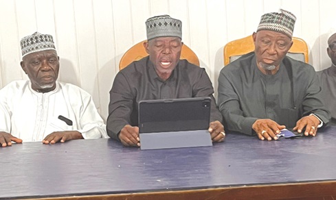 Mohammed Sadis (middle), Secretary of Ghana Hajj Agents Association, addressing the media. With him are other members of the association