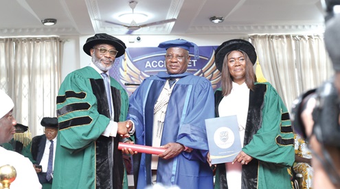 Drolor Bosso Adamtey I (left), Council Chairman of Accra Metropolitan University, conferring the honorary doctorate on COP Christian Tetteh Yohuno, IGP. With them is Prof. Goski Alabi (right), acting Vice Chancellor, Accra Metropolitan University. Picture: BENEDICT OBOUBI Drolor Bosso Adamtey I (left), Council Chairman of Accra Metropolitan University, conferring the honorary doctorate on COP Christian Tetteh Yohuno, IGP. With them is Prof. Goski Alabi (right), acting Vice Chancellor, Accra Metropolitan University. Picture: BENEDICT OBOUBI