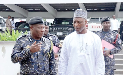 Christian Tetteh Yohuno (left), the Inspector-General of Police, conferring with Alhaji Muntaka Mohammed-Muburak, the Interior Minister, after the opening session Christian Tetteh Yohuno (left), the Inspector-General of Police, conferring with Alhaji Muntaka Mohammed-Muburak, the Interior Minister, after the opening session