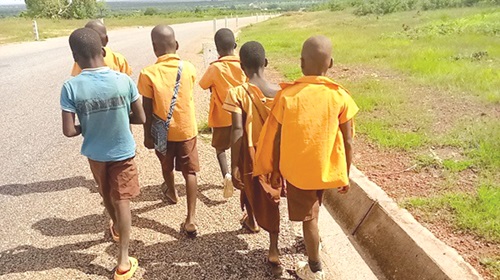 Some rural pupils trekking home after school