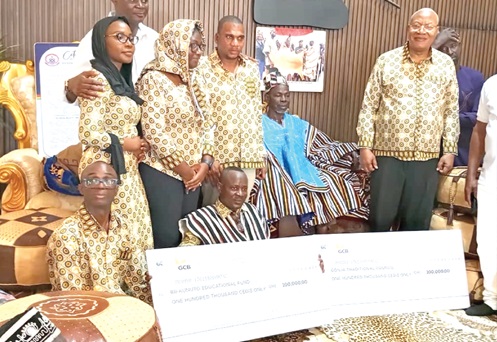 Professor Joshua Alabi (1st from right), Board Chairman of GCB, Farihan Alhassan (3rd from left), Managing Director of GCB, and other staff with Yagbonwura Bii-Kunuto Jewu Soale I (middle), Overlord of Gonja Kingdom Professor Joshua Alabi (1st from right), Board Chairman of GCB, Farihan Alhassan (3rd from left), Managing Director of GCB, and other staff with Yagbonwura Bii-Kunuto Jewu Soale I (middle), Overlord of Gonja Kingdom