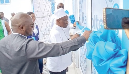 Naa Prof. Edmund Mwinyem Delle Chiir VIII (right), Founder of Rabito Clinics, who is also the Paramount Chief of the Nandom Traditional Area, being assisted by Banguu Delle, CEO, Rabito Clinics, to cut the ribbon Naa Prof. Edmund Mwinyem Delle Chiir VIII (right), Founder of Rabito Clinics, who is also the Paramount Chief of the Nandom Traditional Area, being assisted by Banguu Delle, CEO, Rabito Clinics, to cut the ribbon