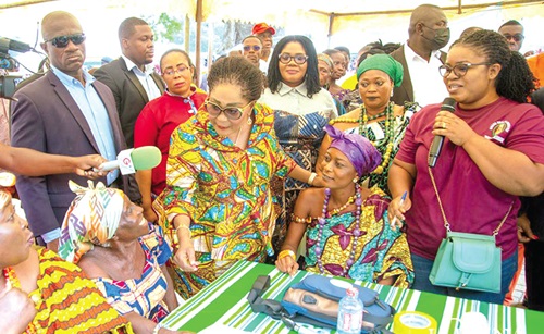 Frist Lady Lordina Mahama (arrowed) speaking with some of the beneficiaries during the health screening Frist Lady Lordina Mahama (arrowed) speaking with some of the beneficiaries during the health screening