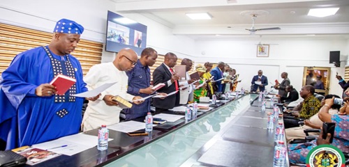 Ahmed Ibrahim (arrowed), Minister of Local Government, Chieftaincy and Religious Affairs, swearing in members of the Local Government Service Council Ahmed Ibrahim (arrowed), Minister of Local Government, Chieftaincy and Religious Affairs, swearing in members of the Local Government Service Council