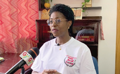 A staff member of Patholab (right) attending to a member of staff of Adabraka Cluster of Schools. INSET: Elizabeth-Irene Baitie, CEO of Patholab Solutions Medical Laboratory, speaking during the interview A staff member of Patholab (right) attending to a member of staff of Adabraka Cluster of Schools. INSET: Elizabeth-Irene Baitie, CEO of Patholab Solutions Medical Laboratory, speaking during the interview