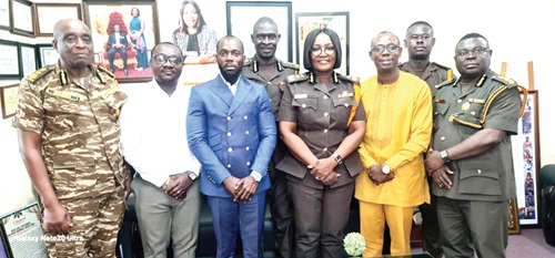 Robert Kwabena Ayitey (3rd from left), MD, BH-FERTAGRO, Patience Baffoe-Bonnie (3rd from right), Director-General of Prisons, and other officials at the meeting Robert Kwabena Ayitey (3rd from left), MD, BH-FERTAGRO, Patience Baffoe-Bonnie (3rd from right), Director-General of Prisons, and other officials at the meeting