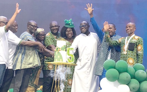 Rev. Fr Charles Ackon (3rd from right), Chairman for the event; Monica Ansaba Kumahor (4th from right), Municipal Director of Education, and other dignitaries cutting the anniversary cake Rev. Fr Charles Ackon (3rd from right), Chairman for the event; Monica Ansaba Kumahor (4th from right), Municipal Director of Education, and other dignitaries cutting the anniversary cake