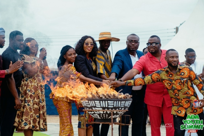 A symbolic highlight came when all speakers, lit the Summit torch