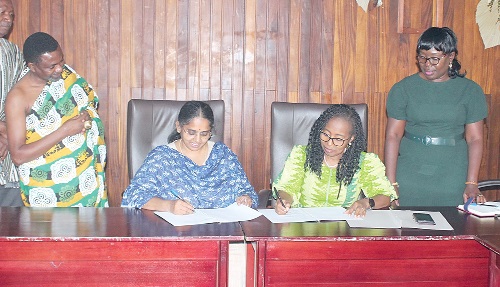 Prof. Marian D. Quain (seated right), Deputy Director General, CSIR, and Saalai Manikam (seated left), MD, Arima Farms Limited, signing the MoU. With them are Barima Acheampong Sarpong II (left), Director, Business Development, Arima Farms Limited, and Naomi Owusu Appiah (right), Director, Commercialisation, CSIR. Picture: ERNEST KODZI Prof. Marian D. Quain (seated right), Deputy Director General, CSIR, and Saalai Manikam (seated left), MD, Arima Farms Limited, signing the MoU. With them are Barima Acheampong Sarpong II (left), Director, Business Development, Arima Farms Limited, and Naomi Owusu Appiah (right), Director, Commercialisation, CSIR. Picture: ERNEST KODZI