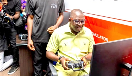 Daniel Aquaye, CEO, Agrimpact, trying his hands on a drone.