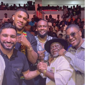 Amir Khan (left) and Sharaf Mahama (right) teamed up to promote the explosive fight night which drew boxing royalty, including former world champions Azumah Nelson (2nd from right) and Anthony Joshua (2nd from left), to the Bukom arena Amir Khan (left) and Sharaf Mahama (right) teamed up to promote the explosive fight night which drew boxing royalty, including former world champions Azumah Nelson (2nd from right) and Anthony Joshua (2nd from left), to the Bukom arena