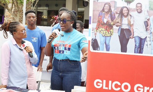 Abena Arhin, a representative of Graphic communications group Ltd, interacting with representatives from GLICO Group