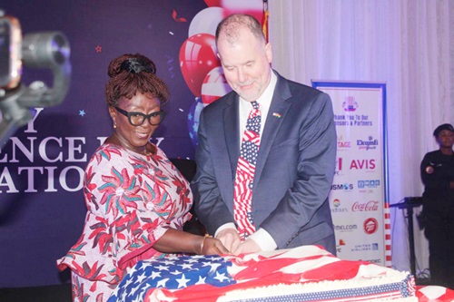 Dzifa Abla Gomashie (left), the Minister of Tourism, Culture and Creative Arts, and Rolf Olson, the Chargé d’Affaires at the US Embassy, cutting a cake decorated in a US flag to commemorate the US’ 249th Independence Day celebration Dzifa Abla Gomashie (left), the Minister of Tourism, Culture and Creative Arts, and Rolf Olson, the Chargé d’Affaires at the US Embassy, cutting a cake decorated in a US flag to commemorate the US’ 249th Independence Day celebration