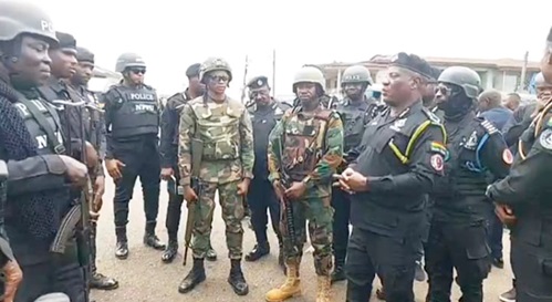 COP Christian Tetteh Yohuno (right), the Inspector General of Police, interacting with some officers during the visit to Asawase COP Christian Tetteh Yohuno (right), the Inspector General of Police, interacting with some officers during the visit to Asawase