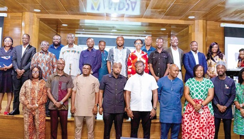 Godwin Kudzo Tameklo (5th from right), Chief Executive of the NPA, and members of the committee
