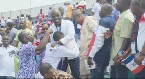 Odeneho Kwaku Appiah being embraced by a delegate Odeneho Kwaku Appiah being embraced by a delegate