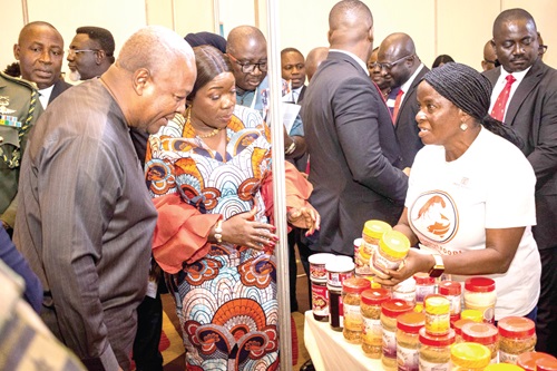 President John Mahama (left), Elizabeth Ofosu-Adjare (middle), Minister of Trade, Agribusiness, and Industry, inspecting a locally made fish powder exhibited during the National Agribusiness Dialogue. Picture: ELVIS NII NOI DOWUONA President John Mahama (left), Elizabeth Ofosu-Adjare (middle), Minister of Trade, Agribusiness, and Industry, inspecting a locally made fish powder exhibited during the National Agribusiness Dialogue. Picture: ELVIS NII NOI DOWUONA
