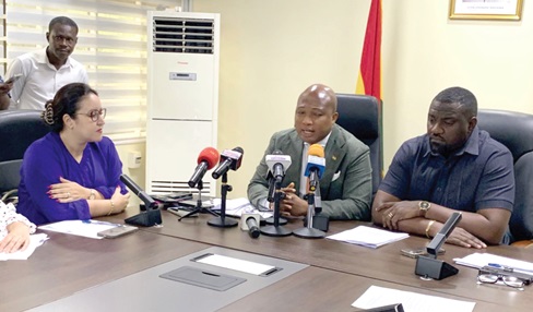 Samuel Okudzeto Ablakwa (middle) addressing the media as Imane Ouaadil (left), the Ambassador of the Royal Kingdom of Morocco, and John Dumelo (right), the Deputy Minister of Food and Agriculture, look on