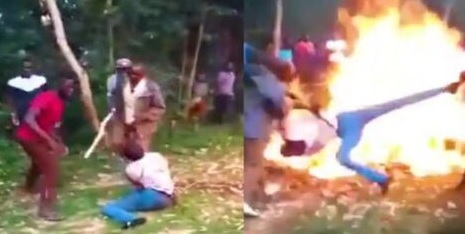 The man being brutally assaulted and thrown into a fire over allegations of chicken theft The man being brutally assaulted and thrown into a fire over allegations of chicken theft