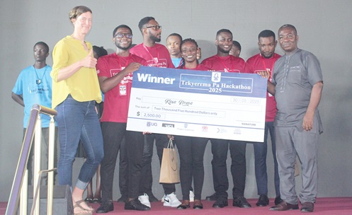 Prof. Ebenezer Owusu, Head of Department, Computer Science, UG, presenting the dummy cheque to the Akasanoma team from the University of Environment and Sustainable Development, for emerging winners of the 2025 Tekyerema Pa Hackathon competition.  Picture: ERNEST KODZI