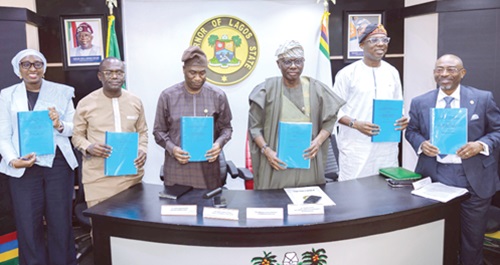 Joseph Siaw Agyepong (2nd from left), Executive Chairman, JGC, alongside the Governor of Lagos State and top officials displaying the signed Waste Management and Processing Concession Agreement between Zoomlion and Lagos State Joseph Siaw Agyepong (2nd from left), Executive Chairman, JGC, alongside the Governor of Lagos State and top officials displaying the signed Waste Management and Processing Concession Agreement between Zoomlion and Lagos State