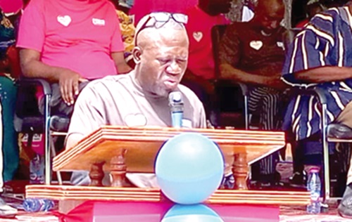Rev. Ibrahim Sebiyam (inset), the Headmaster of the school, speaking at the event Rev. Ibrahim Sebiyam (inset), the Headmaster of the school, speaking at the event