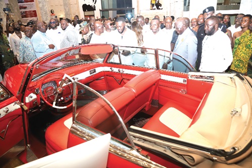 Otumfuo Osei Tutu II (2nd from right) and Osei Kwame Despite (right), Owner of Despite Auto Museum admiring, one of the cars at the museum at East Legon in Accra. Picture: SAMUEL TEI ADANO Otumfuo Osei Tutu II (2nd from right) and Osei Kwame Despite (right), Owner of Despite Auto Museum admiring, one of the cars at the museum at East Legon in Accra. Picture: SAMUEL TEI ADANO