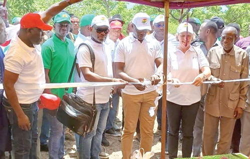 John Abdulai Jinapor (3rd from right), Minister of Energy and Green Transition, being assisted by Magdalena Wust (2nd from right), Head of Corporation at the Swiss Embassy in Ghana, and Dominic Napare (right), Member of Parliament for Sene East, to cut the tape for commencement of the project John Abdulai Jinapor (3rd from right), Minister of Energy and Green Transition, being assisted by Magdalena Wust (2nd from right), Head of Corporation at the Swiss Embassy in Ghana, and Dominic Napare (right), Member of Parliament for Sene East, to cut the tape for commencement of the project