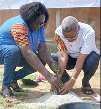 Sir Kt Bro Richard Ayih-Akakpo, the Supreme Knight, and Most Respected Lady Sister Patricia Dunenye, the Grand Lady, planting a seedling after the sod cutting ceremony