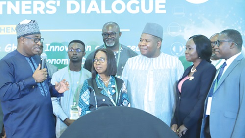 Dr Ibrahim Murtala Muhammed (left), Minister of Environment, Science and Technology, explaining a point to Prof. Paul P. Bosu (right), Director-General of CSIR; Edmond Moukala (3rd from right), Country Director of UNESCO; Suweibatu Adam (2nd from right), Chief Director of MEST; Prof. Marian Quain (4th from right), Deputy Director-General of CSIR, and other officials during the forum. Picture: EDNA SALVO KOTEY