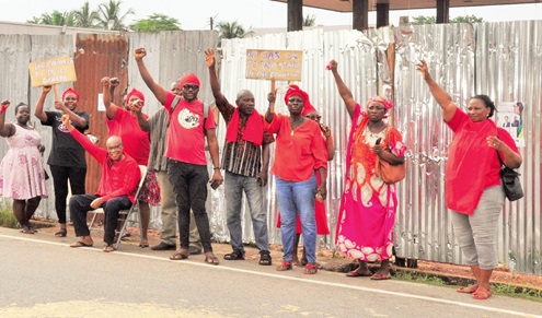Some of the protesters in front of the project site. INSET: The power transformer beside the project site Some of the protesters in front of the project site. INSET: The power transformer beside the project site