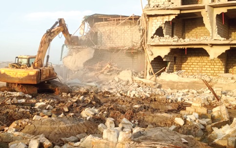 Onauthorised structures being demolished at the Ramsar site Onauthorised structures being demolished at the Ramsar site