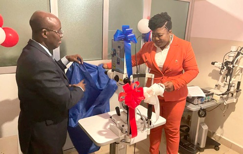 Dr Dziffa-Bella Imelda Ofori-Adjei (right), President of the Ophthalmology Society of Ghana, with Dr Michael Ekuoba Gyasi, Executive Director and Founder of St Thomas Eye Hospital, unveiling the equipment